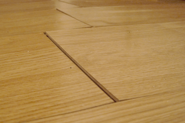 How To Fix Laminate Flooring That Is Lifting [And Why It Happens